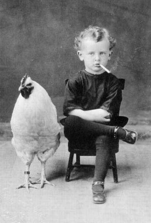 Why Is This Child Smoking a Cigarette Next to a Chicken? - Writer's Block Coffee